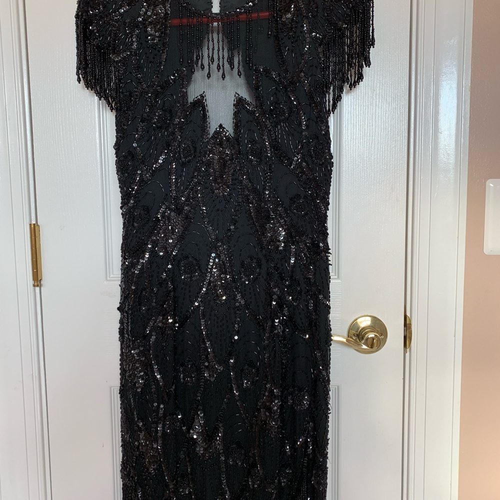 Gorgeous, beaded black dress.